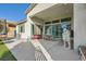 Spacious covered patio with dining and seating area, perfect for outdoor entertaining at 9765 Skye Star Ave, Las Vegas, NV 89166