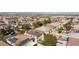 A captivating aerial shot showcases a residential community with diverse home styles and well-maintained landscaping at 10608 Medicine Bow St, Las Vegas, NV 89183