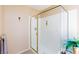 Modern bathroom features a walk-in shower with glass door at 10608 Medicine Bow St, Las Vegas, NV 89183