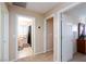 Hallway with doorways to the bathroom and bedroom at 10608 Medicine Bow St, Las Vegas, NV 89183