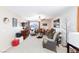 Inviting living room featuring plush sofas, modern decor, and ample natural light at 10608 Medicine Bow St, Las Vegas, NV 89183