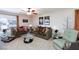 Comfortable living room with sofas, decorative accents, and bright, natural lighting at 10608 Medicine Bow St, Las Vegas, NV 89183