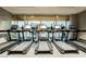 Fitness center equipped with treadmills and large windows offering views of pool area at 2000 Fashion Show Dr # 2403, Las Vegas, NV 89109