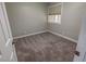 Bedroom features neutral carpeting and natural light at 2506 Paradise Village Way, Las Vegas, NV 89120