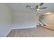 Bright living room with new wood floors and a staircase with white railing at 2506 Paradise Village Way, Las Vegas, NV 89120