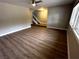 Spacious living room with wood floors, a ceiling fan and ample natural light at 2506 Paradise Village Way, Las Vegas, NV 89120