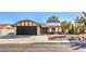 Charming one-story home featuring a two-car garage, solar panels, and low maintenance landscaping at 3337 Irv Marcus Dr, Las Vegas, NV 89108