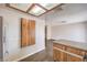 The kitchen features wood cabinets, granite countertops, and a built-in fold away table at 3337 Irv Marcus Dr, Las Vegas, NV 89108