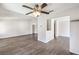 Open-concept living area featuring wood floors and neutral paint, ideal for entertaining and relaxation at 3337 Irv Marcus Dr, Las Vegas, NV 89108