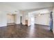 Open-concept living space featuring wood-look floors and abundant natural light at 3337 Irv Marcus Dr, Las Vegas, NV 89108