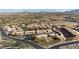 Aerial view of the community highlighting the proximity to lush golf course and desert mountain views at 378 Colleen Ct # G, Mesquite, NV 89027