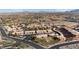 Scenic aerial showing apartments surrounded by golf course with mountains on the horizon at 378 Colleen Ct # G, Mesquite, NV 89027