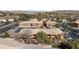 Aerial view of apartment buildings with desert landscaping, covered parking, and easy access to nearby amenities at 378 Colleen Ct # G, Mesquite, NV 89027