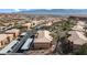 Aerial view of multiple apartment buildings with desert landscaping, parking, and a sense of community at 378 Colleen Ct # G, Mesquite, NV 89027