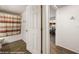 Open bathroom view featuring a tub with a curtain, and tile flooring at 378 Colleen Ct # G, Mesquite, NV 89027