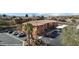 Two-story apartment building with covered parking, desert landscaping, and ample parking spaces for residents and visitors at 378 Colleen Ct # G, Mesquite, NV 89027