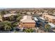 Aerial view of a terracotta-roofed apartment building with covered parking and desert landscaping in a scenic area at 378 Colleen Ct # G, Mesquite, NV 89027