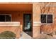 Apartment entrance with landscaped surroundings and covered walkway at 378 Colleen Ct # G, Mesquite, NV 89027