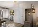 Inviting entryway with stylish decor, including a coat rack and modern lighting fixture at 378 Colleen Ct # G, Mesquite, NV 89027