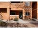 Exterior view of apartment building with walkway and xeriscaping at 378 Colleen Ct # G, Mesquite, NV 89027