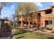 Apartment building exterior with stairs, covered patios and landscaped grounds at 378 Colleen Ct # G, Mesquite, NV 89027
