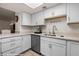 Updated kitchen featuring granite countertops, stainless steel appliances, and modern cabinetry with ample storage space at 378 Colleen Ct # G, Mesquite, NV 89027