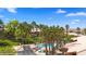Palm tree lined pool for residents with lush landscaping at 378 Colleen Ct # G, Mesquite, NV 89027