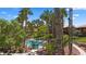 Beautiful pool area with palm trees and seating for residents to enjoy at 378 Colleen Ct # G, Mesquite, NV 89027