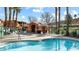 Community pool with shade structures and plenty of seating for residents to enjoy at 378 Colleen Ct # G, Mesquite, NV 89027