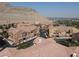 Beautiful aerial view of a residential area with well-maintained homes and scenic mountain backdrop at 3850 Juno Beach St # 203, Las Vegas, NV 89129