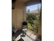 Cozy balcony offers an intimate outdoor retreat with stylish seating and privacy at 3850 Juno Beach St # 203, Las Vegas, NV 89129