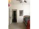 Bright bedroom with a ceiling fan and a charming Captain America poster on the wall at 3850 Juno Beach St # 203, Las Vegas, NV 89129
