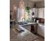 Bright kitchen features stainless steel appliances, granite counters, and pendant lighting at 3850 Juno Beach St # 203, Las Vegas, NV 89129