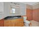 Bathroom featuring wood vanity with granite counters and a tiled walk-in shower at 4506 El Cebra Way, Las Vegas, NV 89121