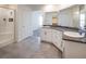 Bright bathroom features dual sinks, granite counters, and a glass-enclosed shower at 4582 Mahogany Hills Ave, Las Vegas, NV 89141