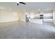 Open-concept living room boasts tile flooring, recessed lighting, and a seamless flow into the modern kitchen at 4582 Mahogany Hills Ave, Las Vegas, NV 89141