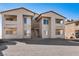 Exterior view of apartment building featuring walkways and parking area at 5689 E Lake Mead Blvd, Las Vegas, NV 89156