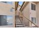 Stairway leading to units in a two-story apartment building at 5689 E Lake Mead Blvd, Las Vegas, NV 89156