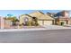 Charming single-story home with a three-car garage and well-maintained front yard landscaping at 6360 Bullring Ln, Las Vegas, NV 89130