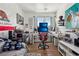 Well-lit bedroom with a desk area, perfect for working and featuring modern decor at 6527 Netherseal Ave, Las Vegas, NV 89139