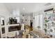 Bright dining area with a view into the living area, tile flooring, and abundant light, perfect for Gathering gatherings at 6527 Netherseal Ave, Las Vegas, NV 89139