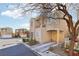 Exterior view of a home featuring a well-kept yard, a driveway, and a visible address number at 6527 Netherseal Ave, Las Vegas, NV 89139