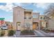Charming two-story home featuring a front balcony, covered parking, and a welcoming front entrance with desert landscaping at 6527 Netherseal Ave, Las Vegas, NV 89139