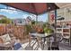 Cozy patio featuring a covered seating area, stylish furniture, and charming decor at 6527 Netherseal Ave, Las Vegas, NV 89139