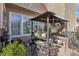 Covered patio with shade, furniture, and plants at 6527 Netherseal Ave, Las Vegas, NV 89139
