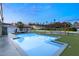 Luxurious pool with a pergola covered dining area, ideal for entertaining guests at 7440 Edna Ave, Las Vegas, NV 89117