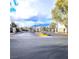 View of gated community entrance, offering security and privacy, with mountains in the background at 7515 Splashing Rock Dr, Las Vegas, NV 89131
