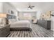 Bright and airy main bedroom featuring hardwood floors and a ceiling fan at 781 Drammatico Pl, Henderson, NV 89011