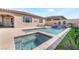 Relaxing pool and spa featuring a water feature and plenty of patio space, perfect for outdoor enjoyment at 781 Drammatico Pl, Henderson, NV 89011