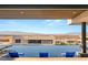 Stunning infinity pool overlooking the Las Vegas city skyline and mountain range in the background at 805 Magnum Cliff Ct, Henderson, NV 89012